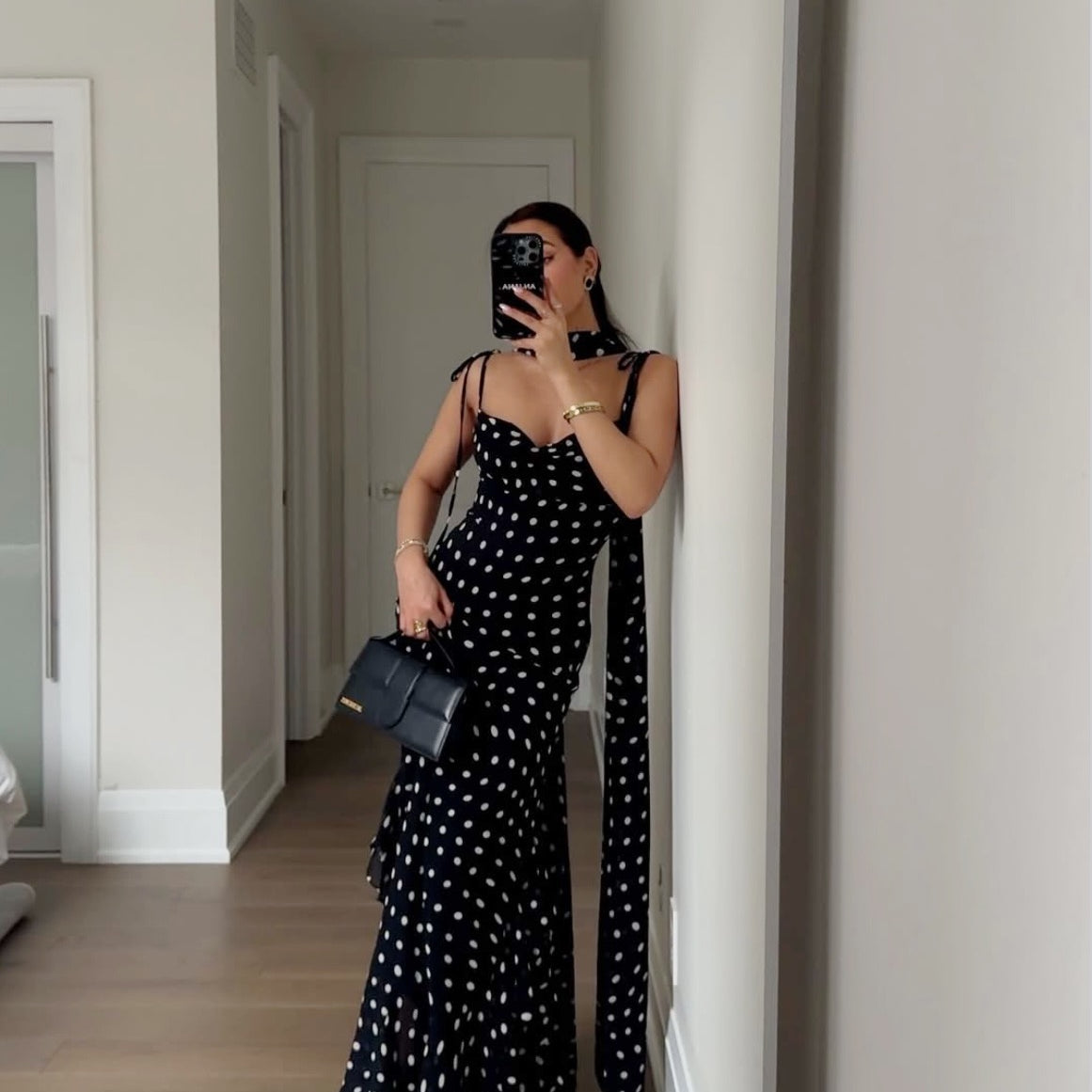 Ruffled spotty black and white dress