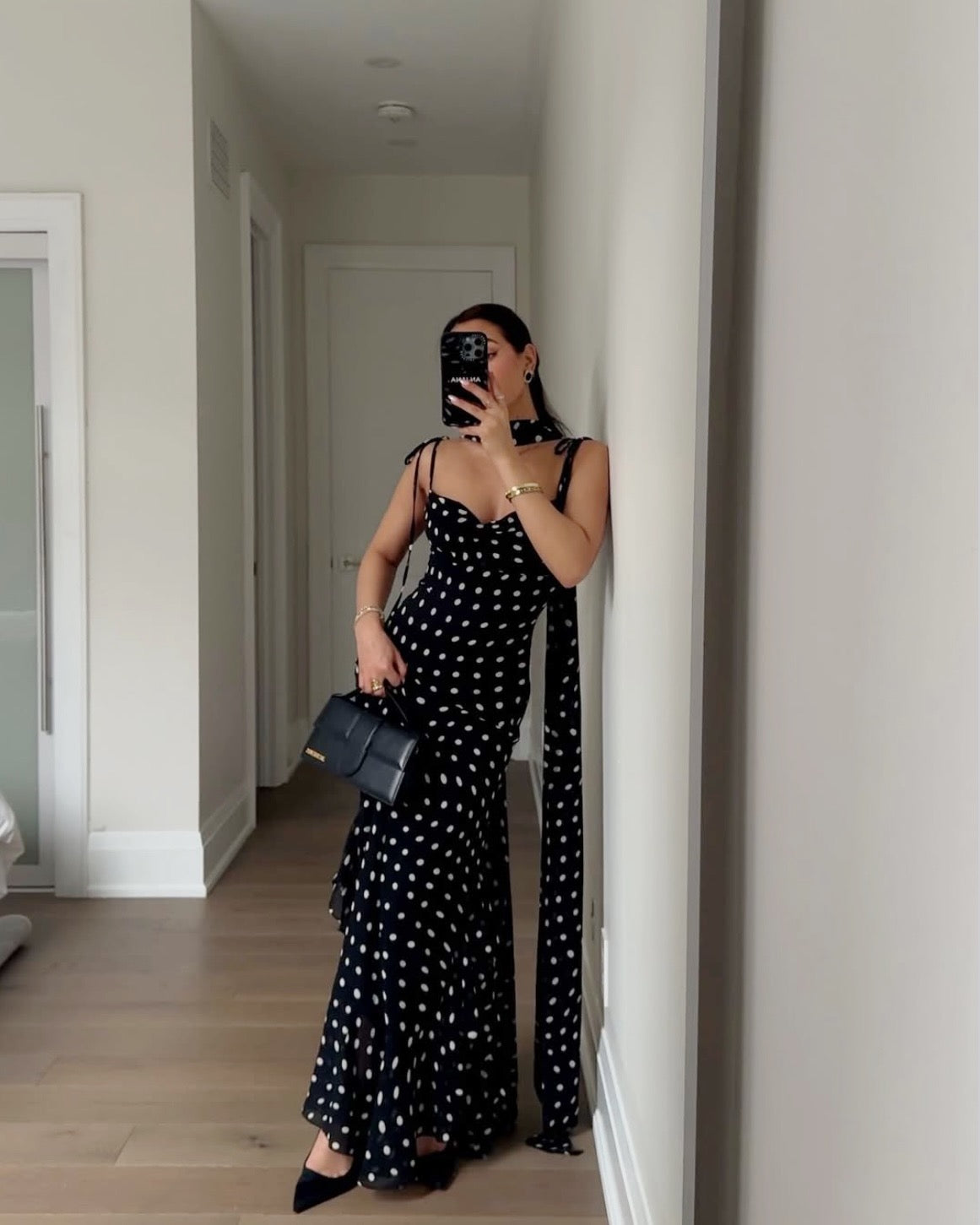 Ruffled spotty black and white dress